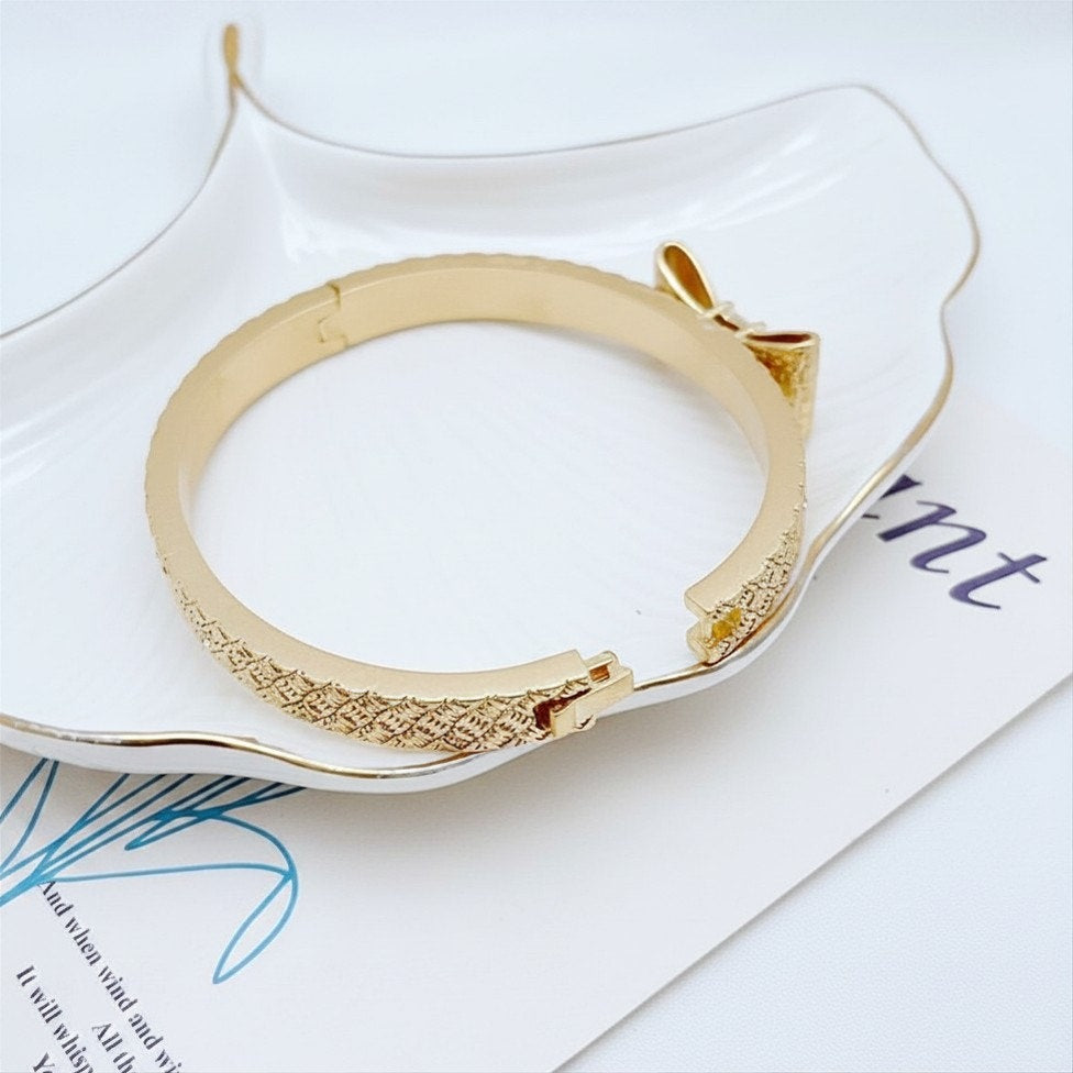 Kate Spade New York Wrapped In A Bow Hinged Bangle