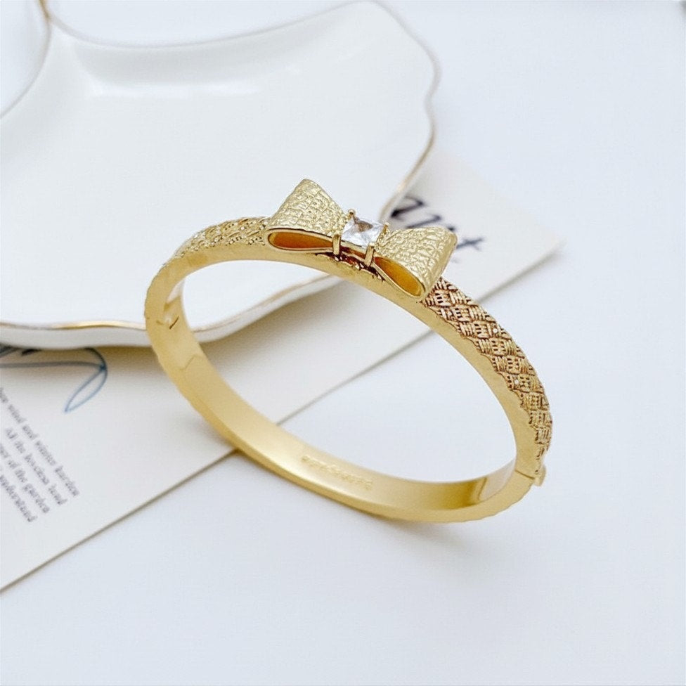 Kate Spade New York Wrapped In A Bow Hinged Bangle